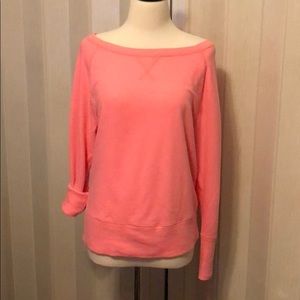 pink sweater made in Cambodia